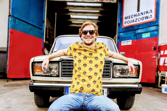 1.5h Crazy Guides' Communism Tour of Nowa Huta in Classic Car - Visiting the Lenin Steelworks Main Gates and Industrial Landmarks