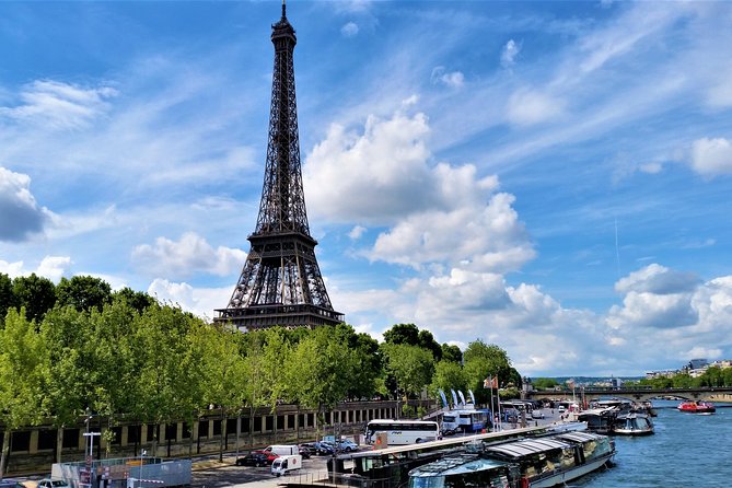 1 Day in Paris: Eiffel Tower, Cruise, City Tour, and Louvre - Visiting the Eiffel Tower with Expert Insight