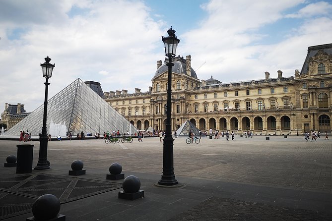 1 Day in Paris: Eiffel Tower, Cruise, City Tour, and Louvre - The Coach City Tour: Iconic Landmarks in Transit