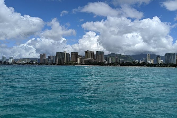12pm Turtle Canyon Snorkel Adventure - Sailing and Dolphin Watching Around Diamond Head