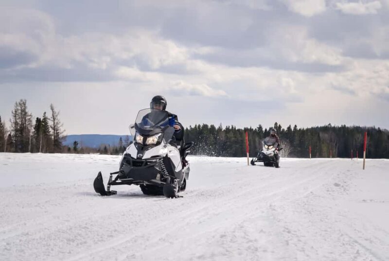 15 min. Tadoussac: Snowmobile Expedition in Saguenay Fjord - Snowmobiling Through Quebec’s Breathtaking Landscapes