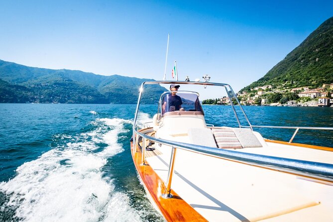 1H Private Cruise on a beautiful wooden speedboat on Lake Como - Admiring Villa Olmo from the Lake