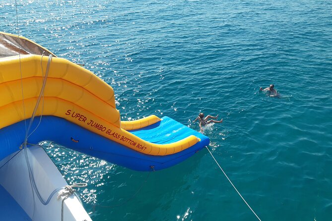 2.5 hour Glass Bottom Boat Trip, Snorkeling, Sliding and Fun - The Exclusive Jumbo Slide: Heightened Fun on the Main Deck