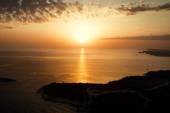 2-Hour Guided Transparent Kayak Sunset Tour from Premantura - Snorkeling and Island Stops