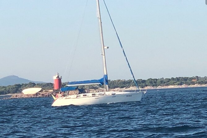 2-hour sunset tour by sailboat with aperitif. - Alghero’s Historic Walls and Nighttime Views