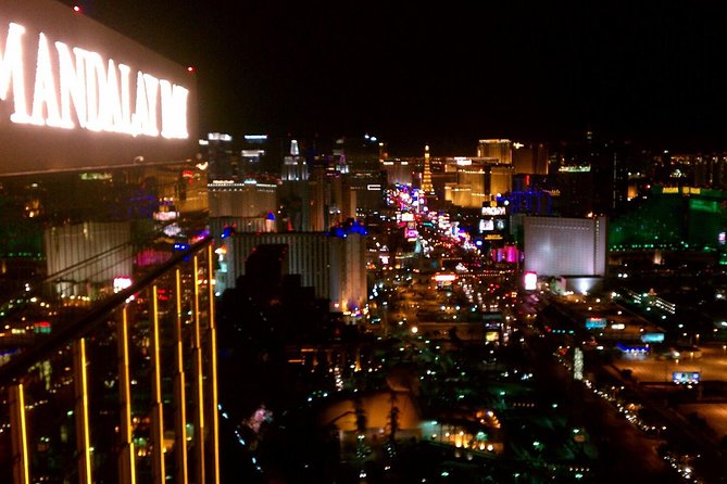 2-Hour Vegas Strip Walking Tour with Photos,Champagne & Vintage Vegas Goody Bags - Key Points