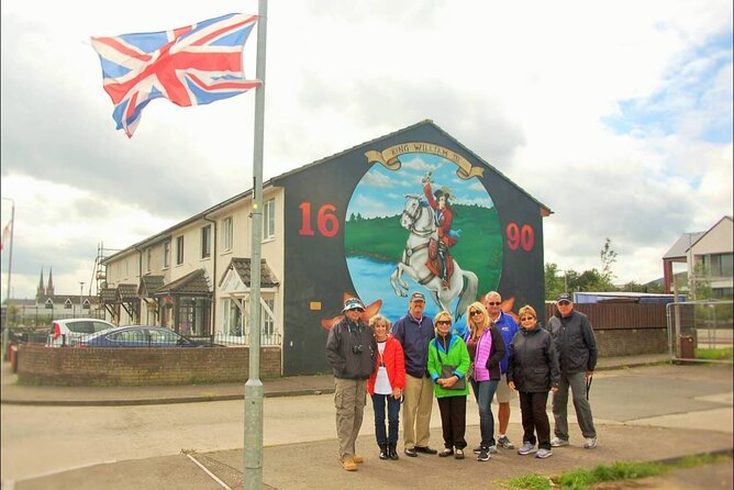 2hours Republican & Loyalist Mural Black Taxi Tour from Belfast - Visiting the International Mural Wall on Divis Street