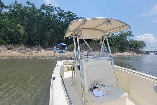 3 hour BYOB Morning Boat and Beach Excursion on Southern Charm - Approaching the Yorktown Aircraft Carrier and Fort Sumter