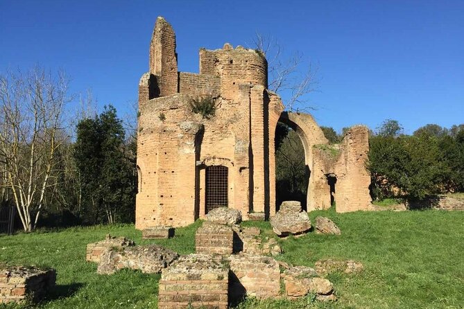 3-Hour Catacumbs and Appian Way Park Guided Tour in Golf Car Pickup - View of Caracalla Hot Springs