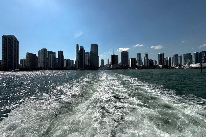 3 Hour Party Boat Jet ski Banana Tube and open bar in Miami - Scenic Cruising Past Miami’s Iconic Sights