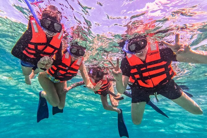 3 in 1 Catamaran Tour to Isla Mujeres from Cancun All Inclusive - Beach Relaxation and Island Food on Isla Mujeres