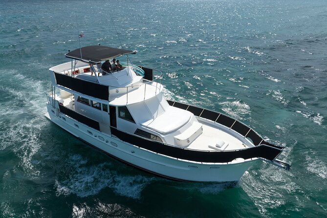 4 Hours - 53' Hatteras - Tulum, Playa Del Carmen, Riviera Maya - The Private Yacht Experience: Customizable Sea Adventure