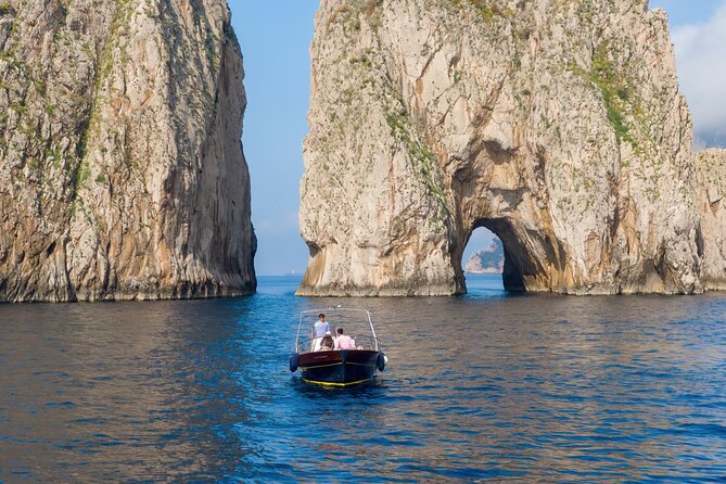 4 Hours Private Boat Tour of Capri - Admiring the Punta Carena Lighthouse from the Water
