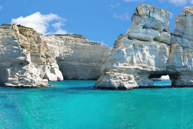 5 Hour Milos to Kleftiko and Sykia Boat Cruise - Tsigrado Beach: Private Feel and White Sand Slides