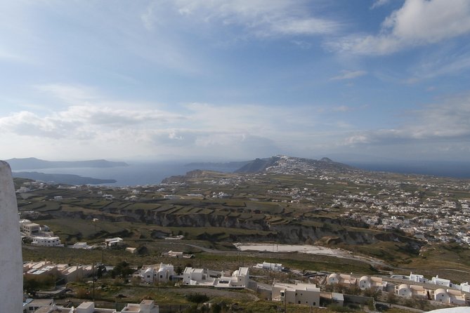 6 hours Private Full Santorini Highlights - Enjoying Black Sand at Perivolos Beach