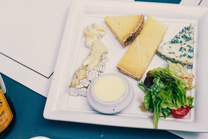 A Morning in Paris Food Tour: Croissants, Baguettes & Chocolate - Savoring French Cheeses with Fresh Baguette and Premium Butters