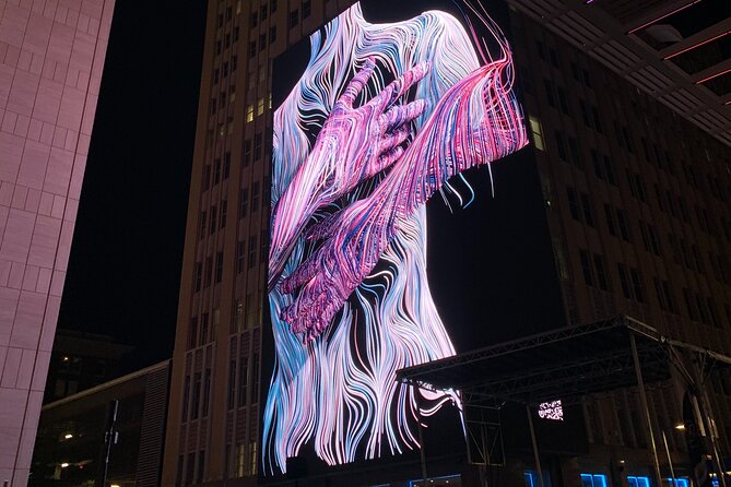 A True Crime Walking Tour Through Downtown Dallas - Neon Lights and the History of Lynching at Pegasus Plaza
