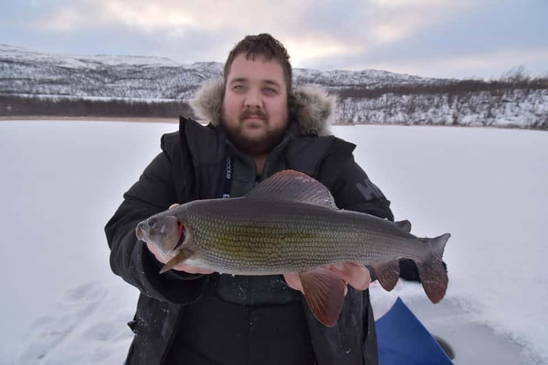 Abisko: Ice Fishing Experience - Abisko Ice Fishing Tour Starts at STF Abisko Guesthouse