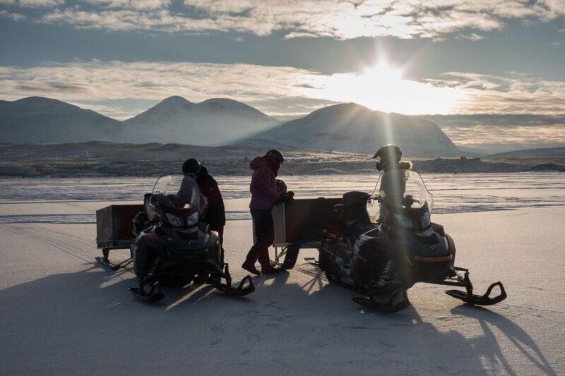 Abisko: Snowmobile Sled Expedition with Snack and Hot Drink - Key Points