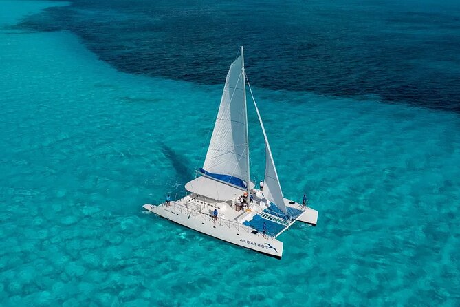 Adults-Only Sunset Catamaran Cruise to Isla Mujeres - Sunset Sailing and Return to Cancun
