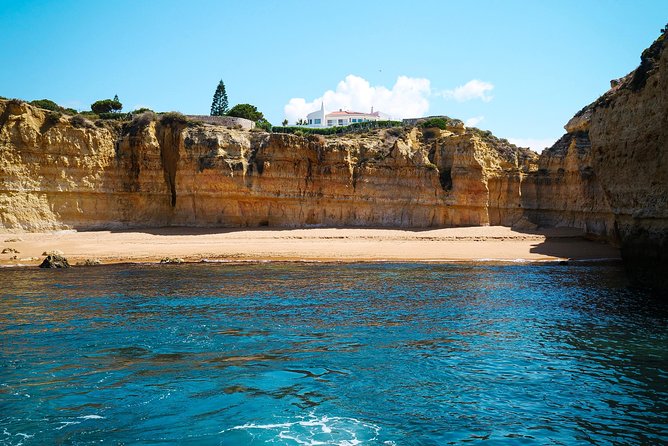 Afternoon Cruise Sunseeker Portofino 53 - Specific Stops: Falésia Beach and Praia da Coelha