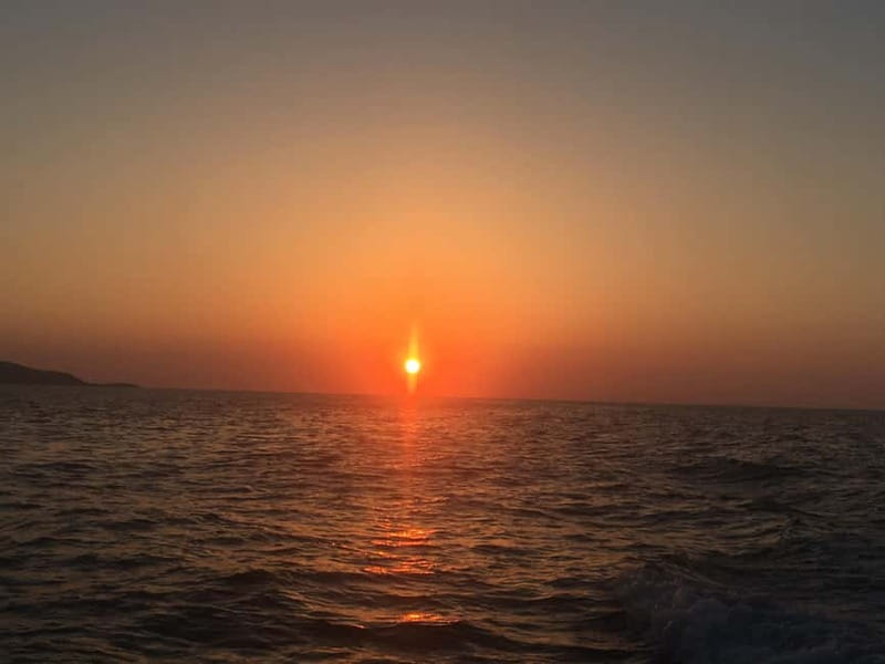 Agia Pelagia: Sunset Motorboat Tour with Soft Drinks - Key Points