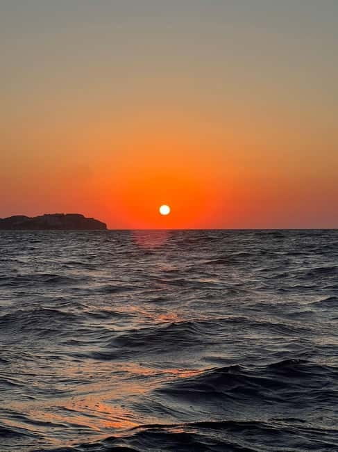 Agia Pelagia: Sunset Motorboat Tour with Soft Drinks - Important Restrictions and Accessibility