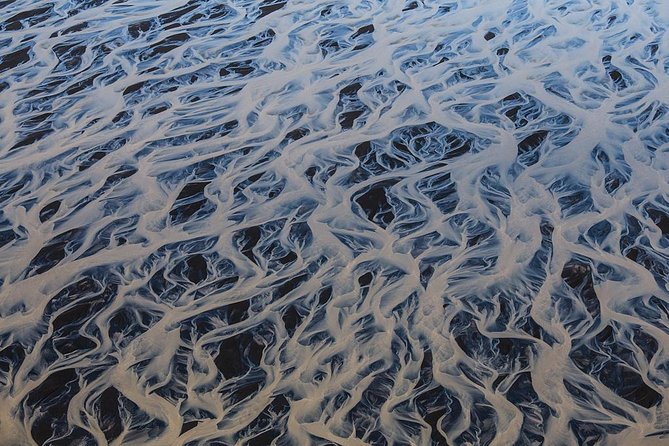 Airplane tour over black sands and riverbeds from Skaftafell - The Experience of Flying Over Iceland’s Coastline