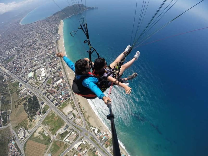 Alanya: Tandem Paragliding SkyDiving With Pick-up & Drop-off - Costs, Inclusions, and Extra Fees