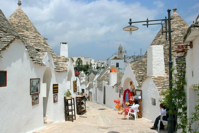 Alberobello private walking tour with gelato tasting - Detailed Look at the Tours Main Districts: Aia Piccola and Rione Monti