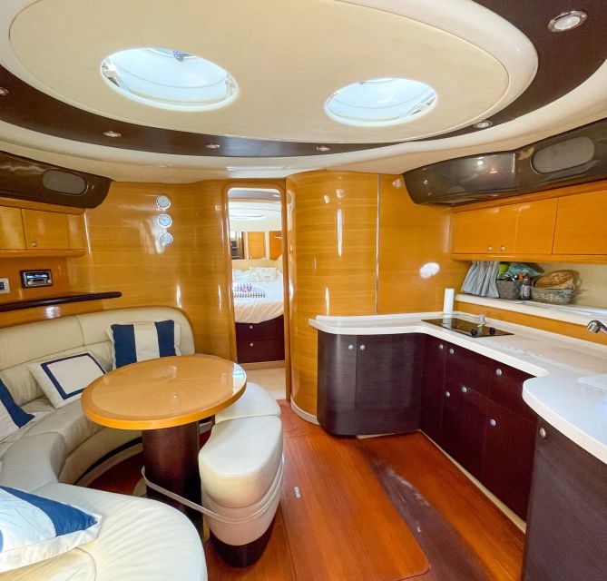 Albufeira: Algarve Private Sunset Yacht Charter - Visiting the Benagil Caves and Marinha Beach