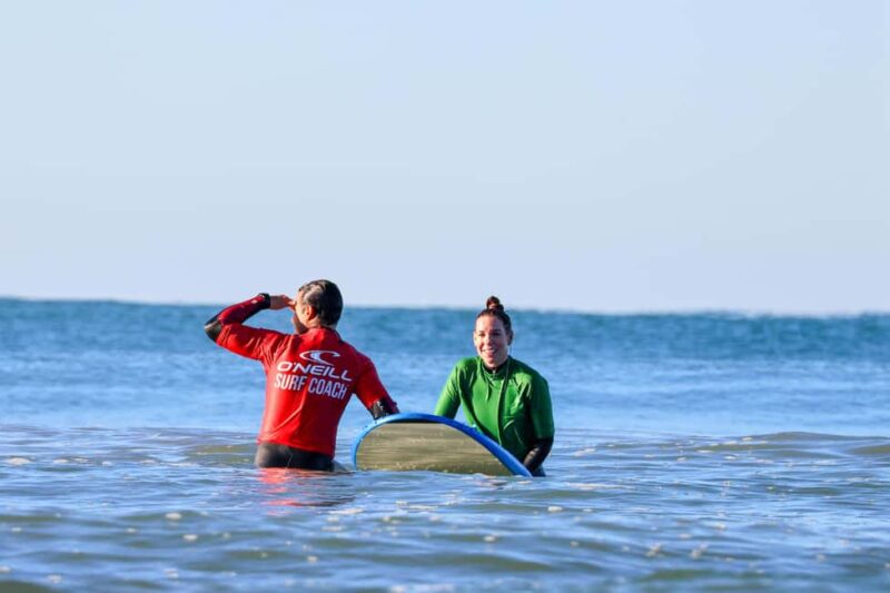 Albufeira: Learn to Surf in Chill Beach Vibes & Good Times - Meeting Point at the Big Yellow Logo Shop in Albufeira