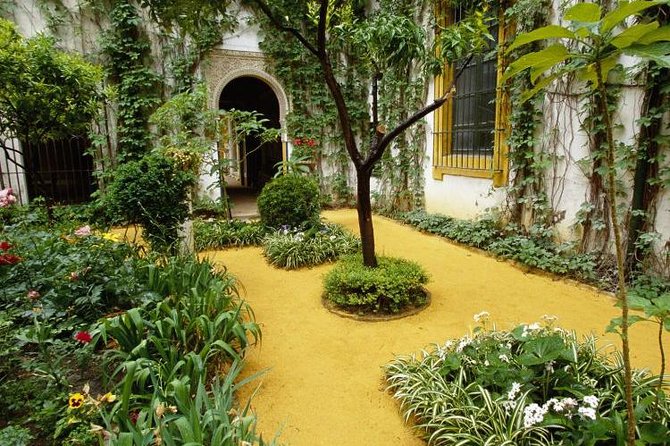 Alcázar and Jewish Quarter Guided Walking Tour in Seville - Key Points