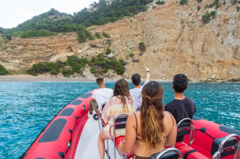 Alcudia: Sightseeing, Sea Caves & Snorkel Speedboat Tour - Onboard Atmosphere: Music, Safety, and Flexibility