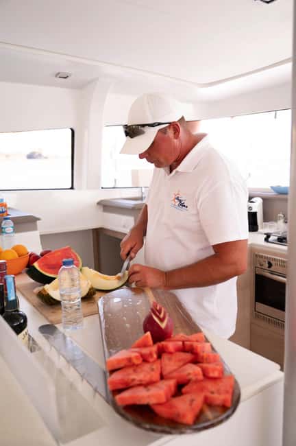 Algarve: Catamaran Cruise with Paddleboarding & Snacks - Scenic Stops at Benagil Caves and Ponta da Piedade