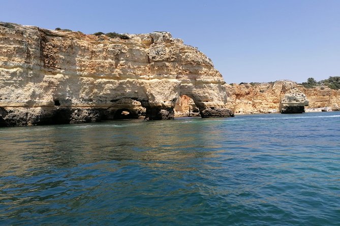 ALGARVE FROM THE SEA PORTIMÃO includes boat trip to Benagil caves AND LAGOS - Exploring Praia da Marinha and Its Crystal-clear Waters