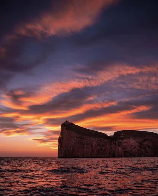 Alghero: boat tour with aperitif at sunset Porto Conte - Key Points