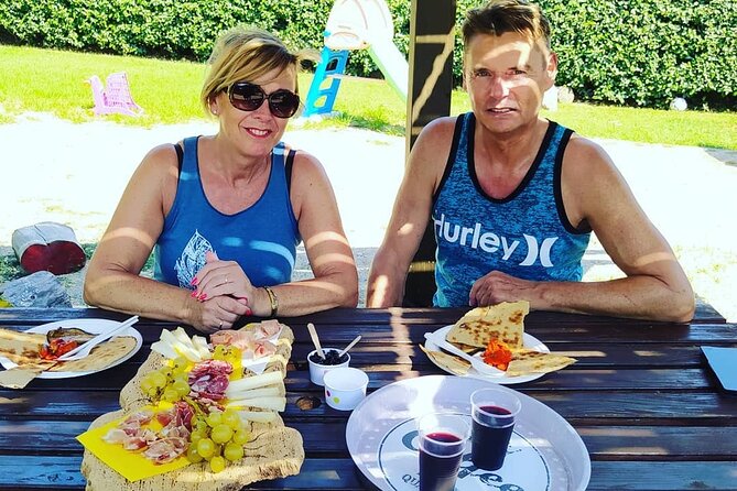 Alghero - Small Beaches Tour by E-bike more aperitif - Practical Details: Booking, Meeting Point, and Group Size