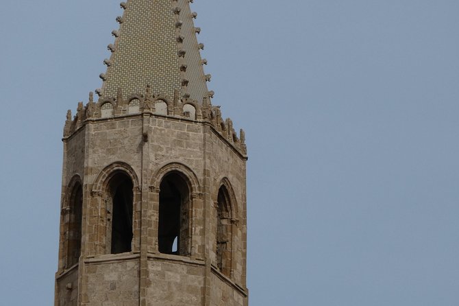 Alghero: walking tour with bilingual local guide - Walking Along the Town Walls at Torre di San Giacomo