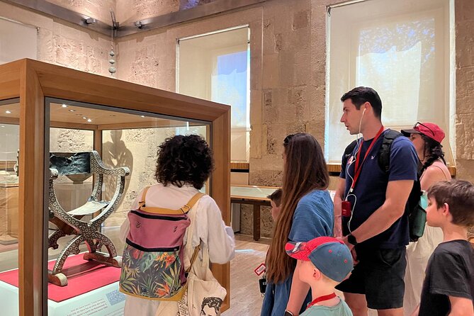 Alhambra Surroundings Guided Tour - Exploring the Court of the Cisterns at Plaza de los Aljibes