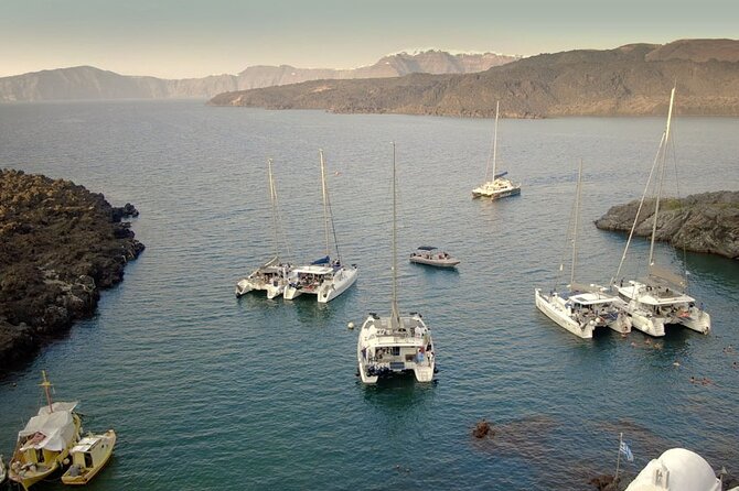 All-Inclusive: Santorini Luxury Sunset Cruise with Greek Meal - Sailing Past the Santorini Lighthouse and Caldera Rim
