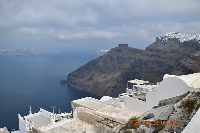 All of Santorini in 6 hours (private) - Relaxing at Perissa Black Sand Beach