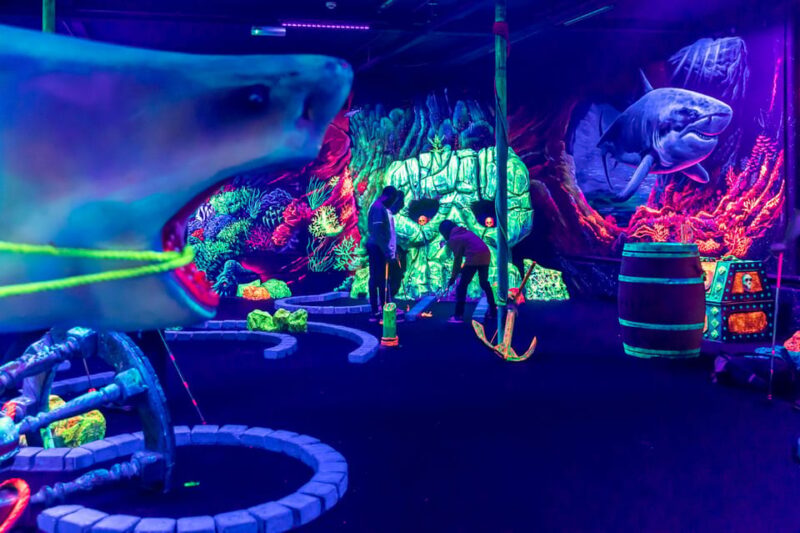Aloha Amsterdam: 12-Hole Glow-in-the-Dark Mini-Golf - Key Points