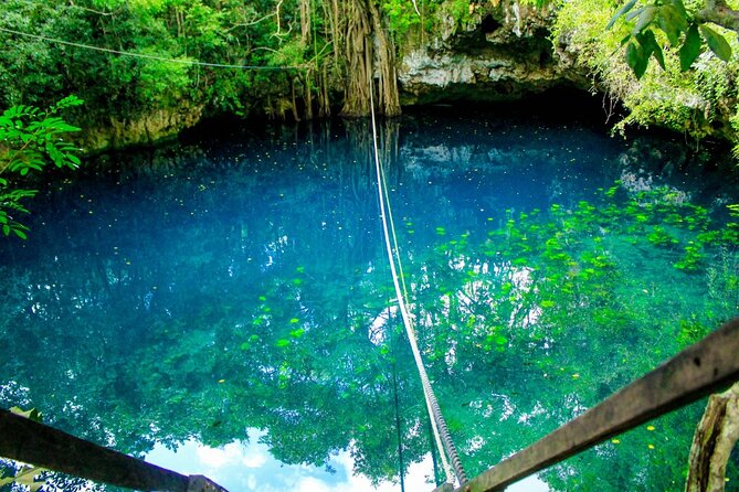 Amazing ATV Tour, Ziplines and Cenote Swim with Lunch and round trip included - Discovering the Sacred Cenote: A Cultural Highlight