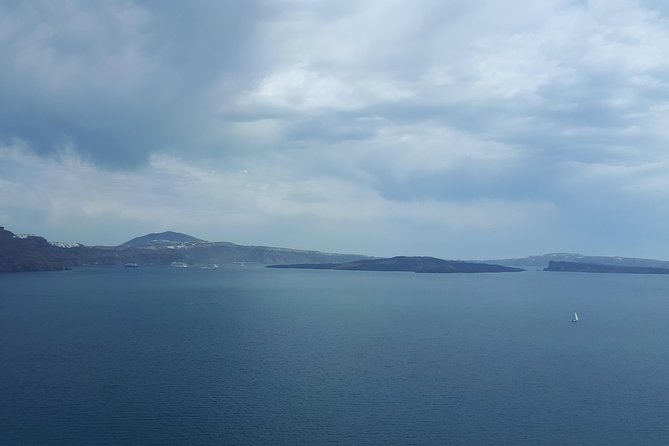 Amazing sightseeing in Santorini - Strolling Along the Black Sand at Perivolos Beach