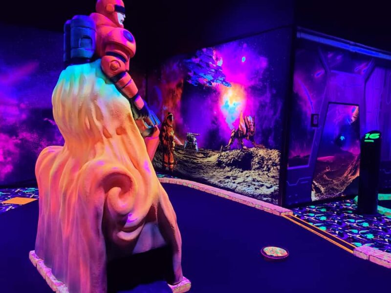 American Dream: Blacklight Mini Golf Entry Ticket - How the Intergalactic Theme Creates a Unique Mini Golf Experience