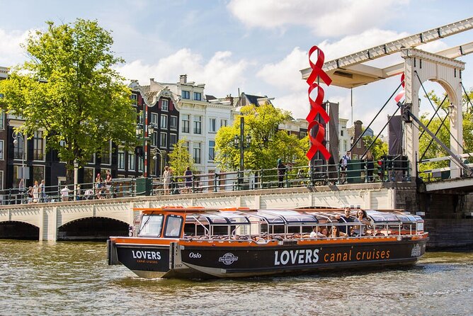 Amsterdam 1h Canal Cruise by Semi-Open Boat with Audio Guide - A Compact One-Hour Cruise Through Amsterdam’s Waterways