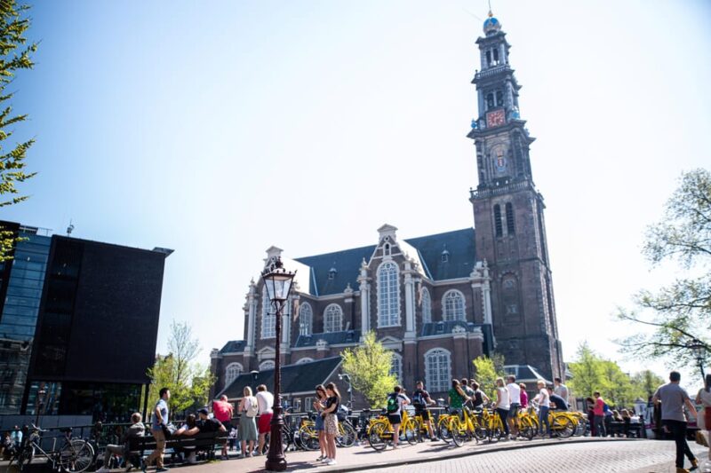 Amsterdam: 2-Hour City Highlights Guided Bike Tour - Crossing the Iconic Skinny Bridge and Vondelpark