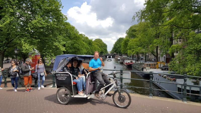Amsterdam: 2-Hour Sightseeing Tour by Rickshaw - Visiting Key Sites like Begijnhof, Civic Guards Gallery, and Holocaust Memorial