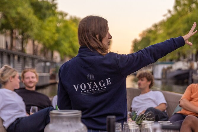 Amsterdam 2-Hour Small Group Canal Cruise w/ Dutch snacks & Bar - The Guide’s Role and Guest Experience
